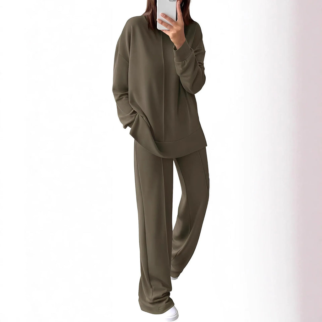 Women's long sleeve polyester jogging suit set shown in army green, available in five other colours.