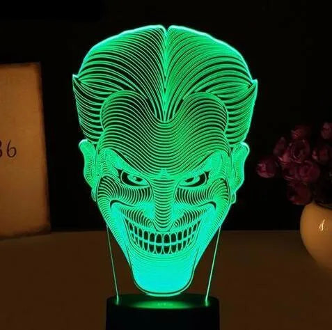 USB-powered 3D acrylic LED table lamp showing colourful gradient lighting on a desk.