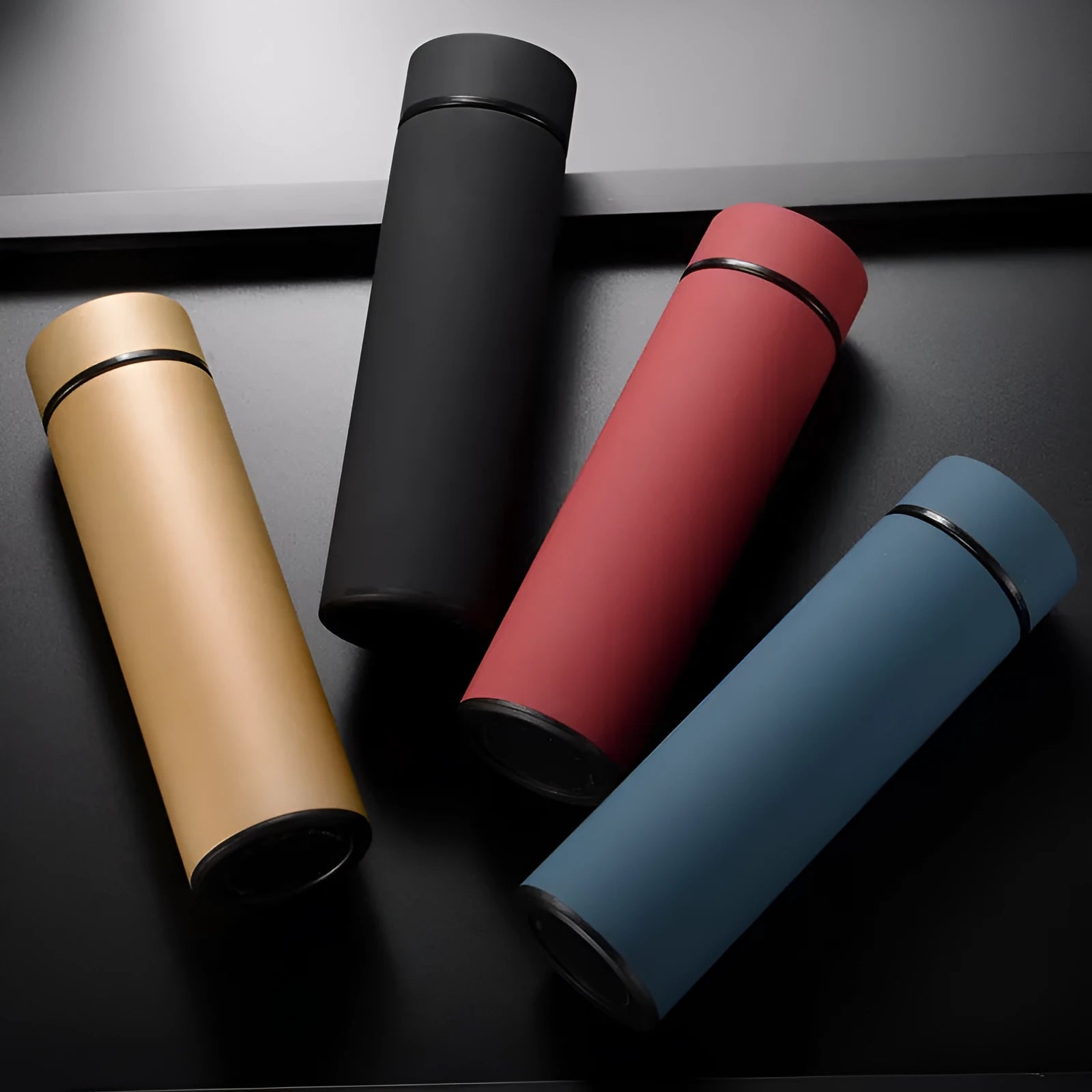 450ml stainless steel vacuum water bottle with arrow mouth in black, red, gold, and blue colour options.