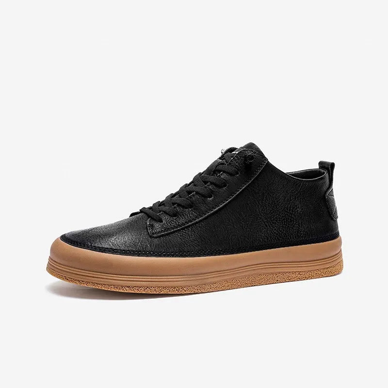 Men's black leather casual trainers with white rubber soles and laces on a white background.