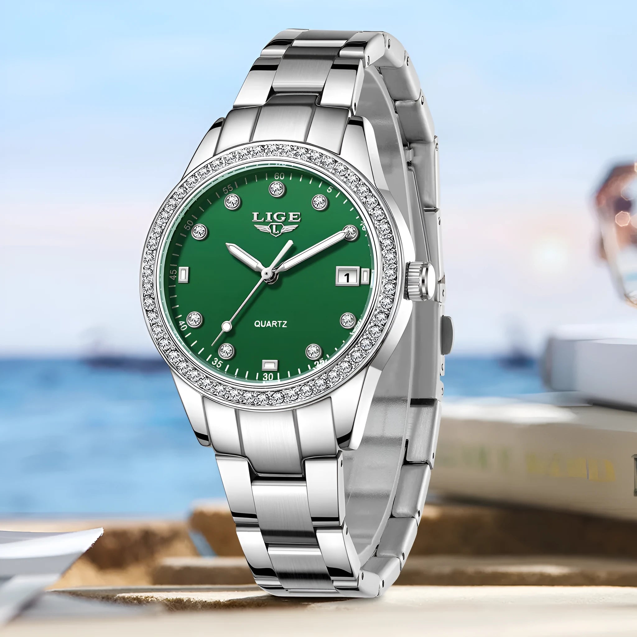 Silver stainless steel fashion watch with diamond-encrusted dial and luminous hands.