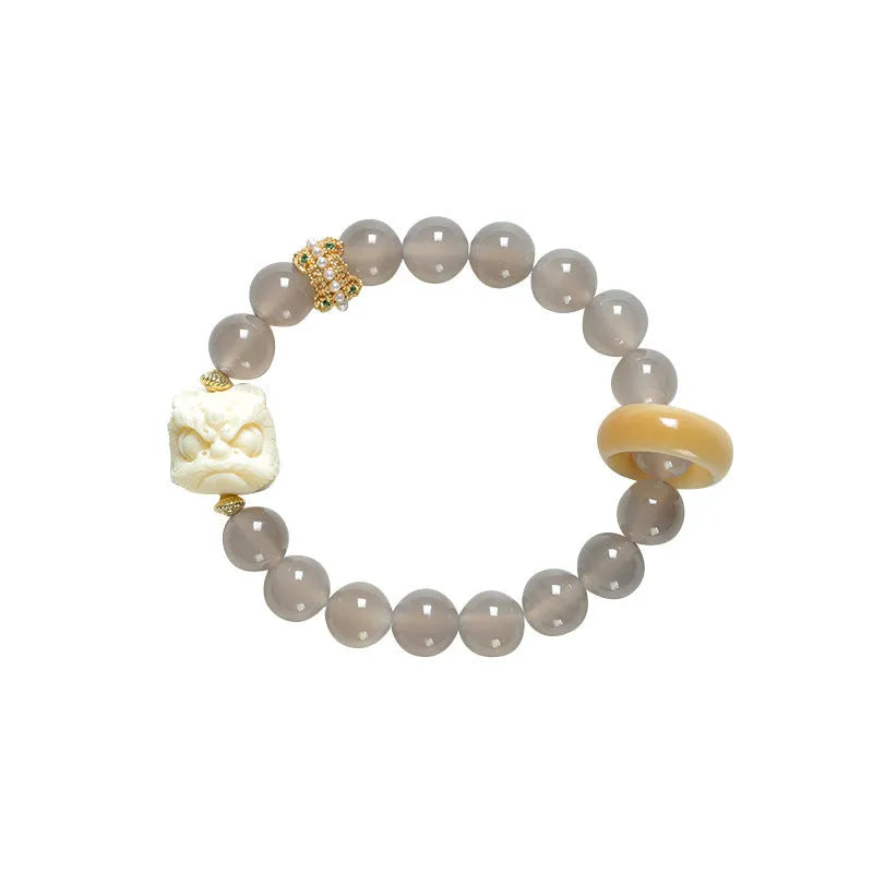 Hand-woven gray agate and mellite bracelet with 10mm round beads