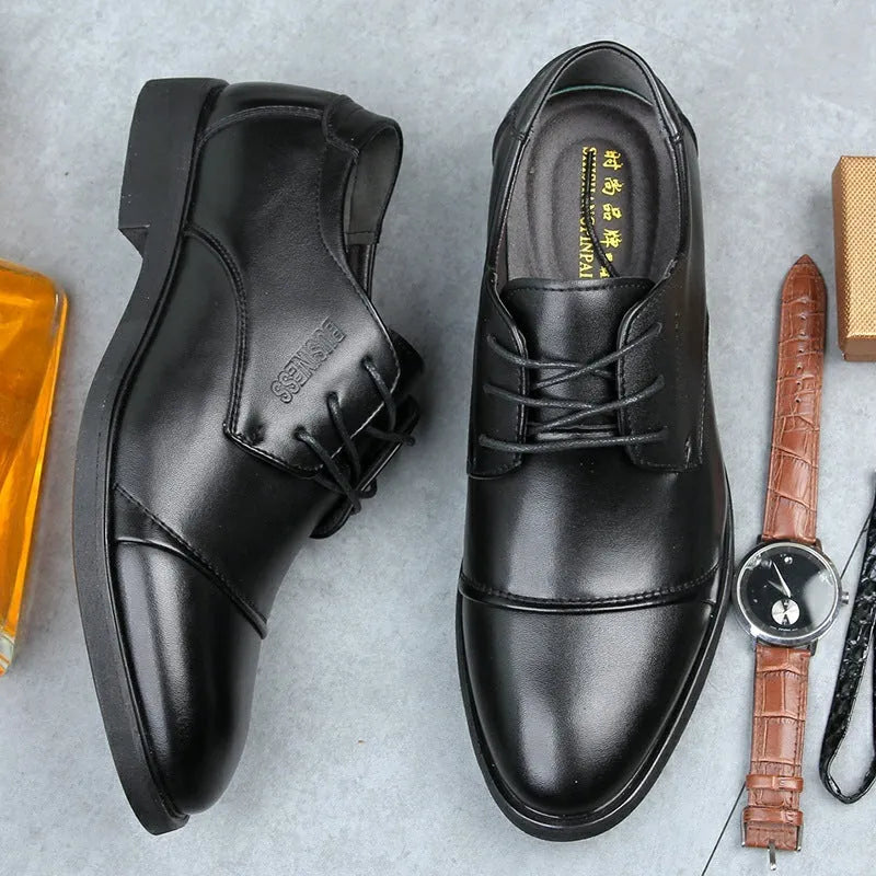 Men's black formal lace-up shoes with rubber sole and horse buckle detail