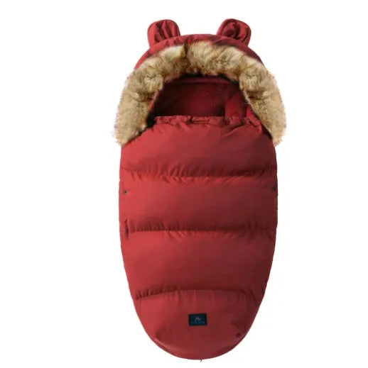 Baby warm cocoon style sleeping bag on a neutral background demonstrating solid colour design with zip closure