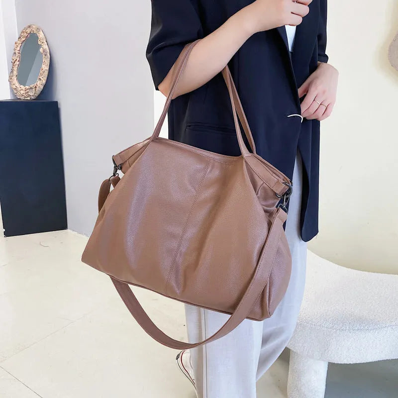 Large soft PU messenger bag in horizontal square shape with adjustable shoulder strap