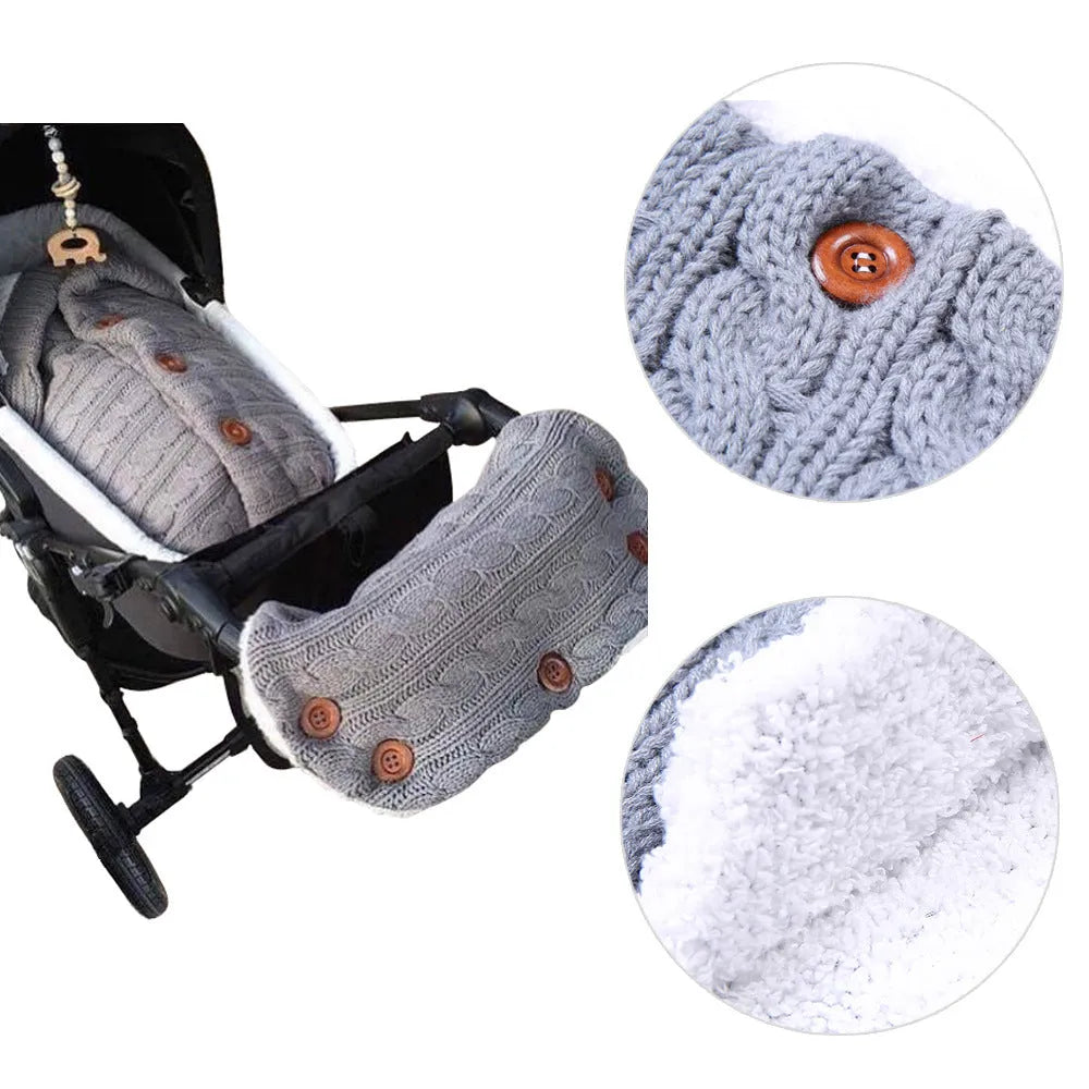 Baby sleeping bag in beige with lamb wool and acrylic material, button opening, and matching gloves on pram