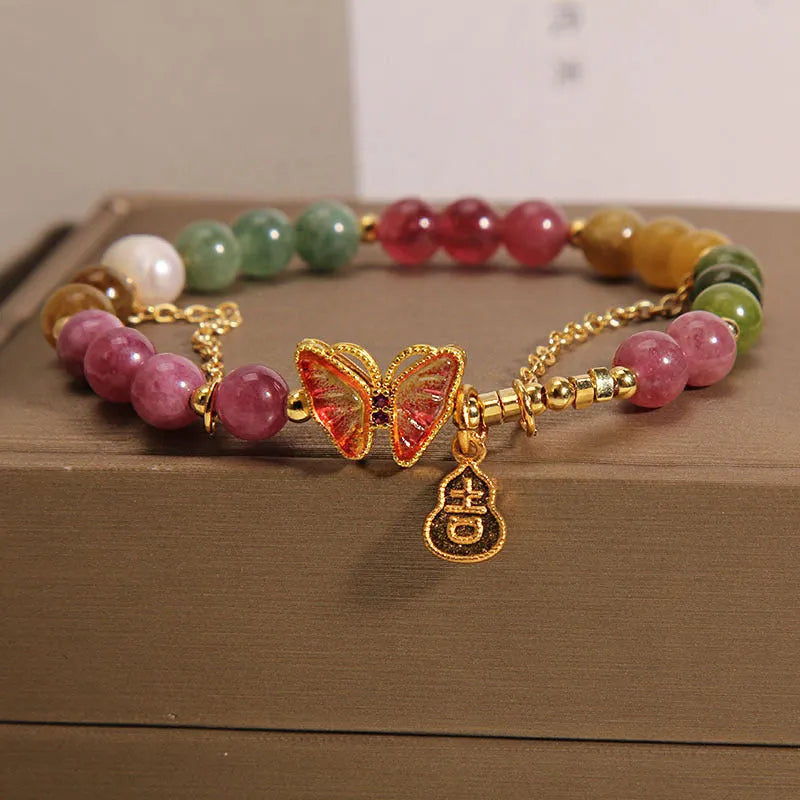 Natural jade coloured tourmaline bracelet with butterfly gourd pendant on adjustable agate bead band
