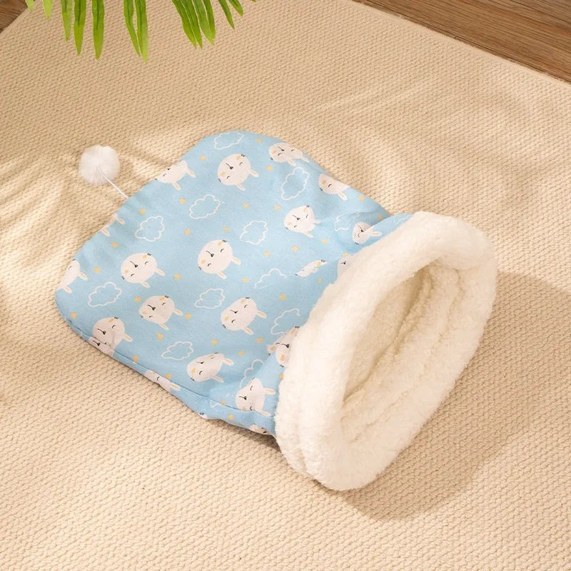 Flannel cat sleeping bag nest pet bed in blue rabbit design, 50cm by 40cm.