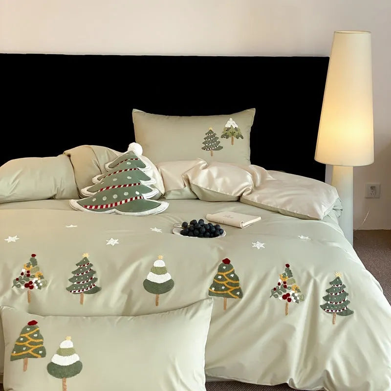 Cream Blue pure cotton duvet cover with raised towel embroidery of a Christmas tree and flowers, part of a four-piece bedding set.