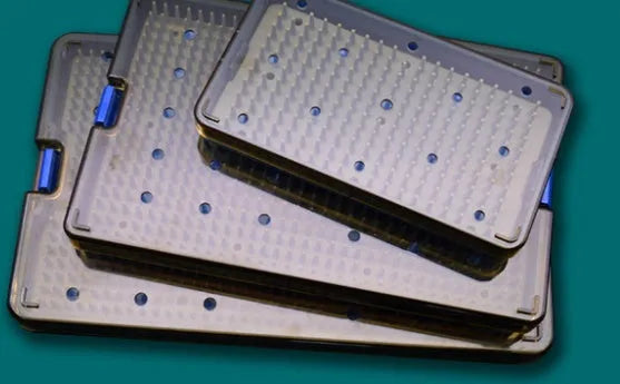 Silicone UV disinfection box open, showing interior with UV light and a mobile phone inside.