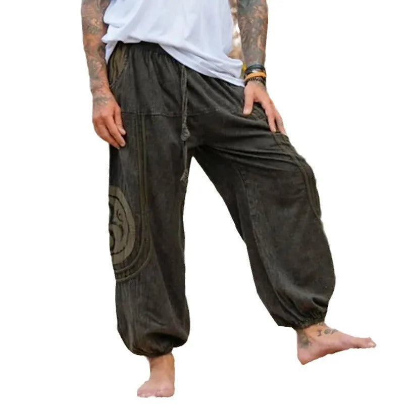 Dark green men's trousers with ethnic pattern and adjustable ankle ties