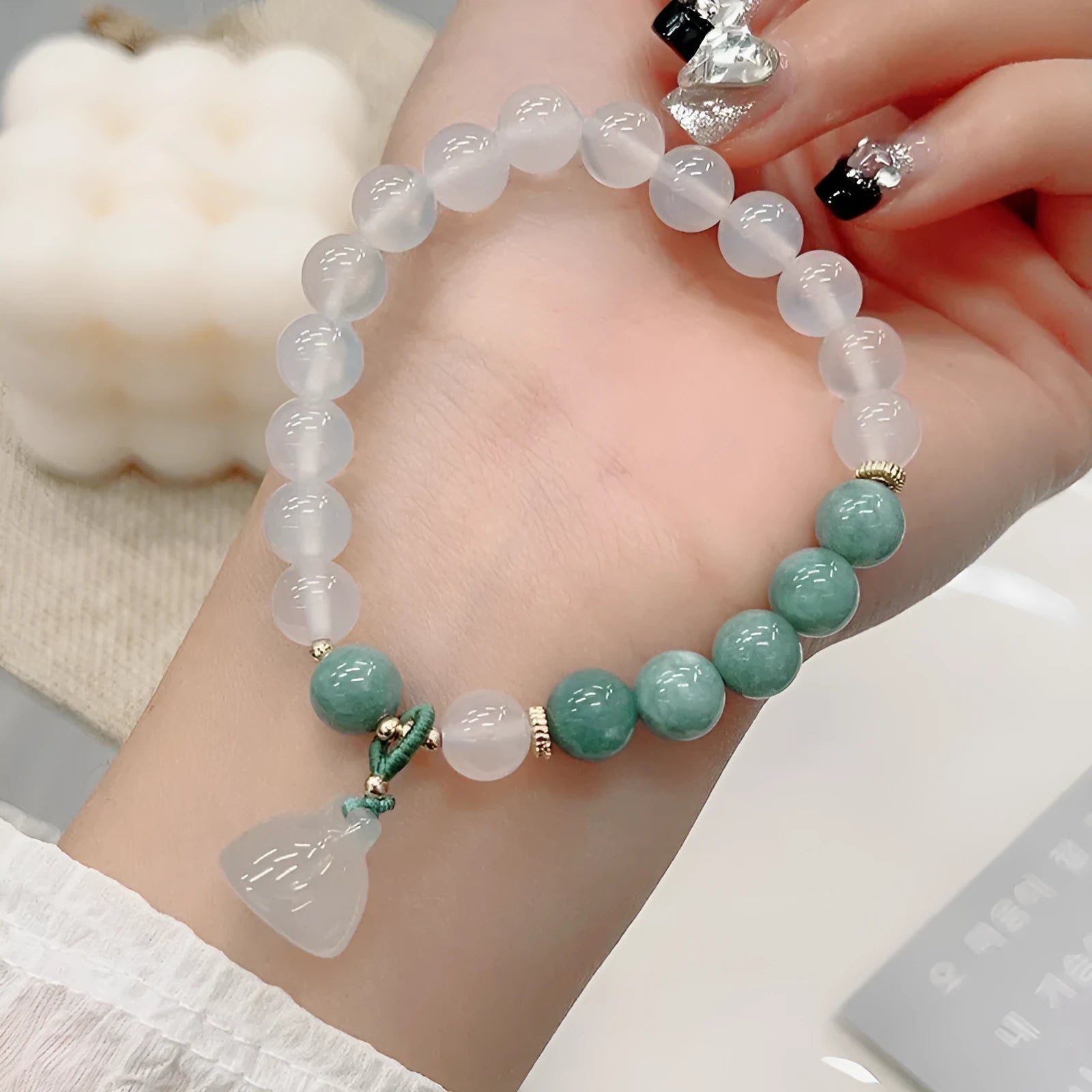 Women's agate bracelet with lotus seedpod design in retro Chinese style, adjustable fit