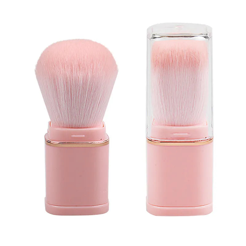 Portable retractable makeup brush with black telescopic handle and artificial fibre bristles for powder blusher application
