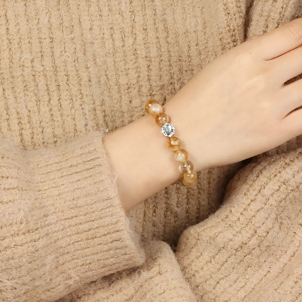 Geometric crystal citrine bracelet with 10mm size and grinding treatment in unisex style.