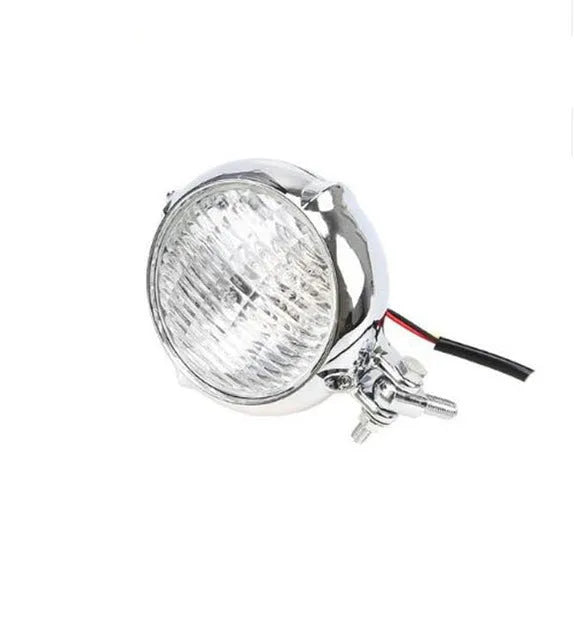 Black electroplated retro Harley headlight with 8 cm cast aluminium housing and halogen bulb.