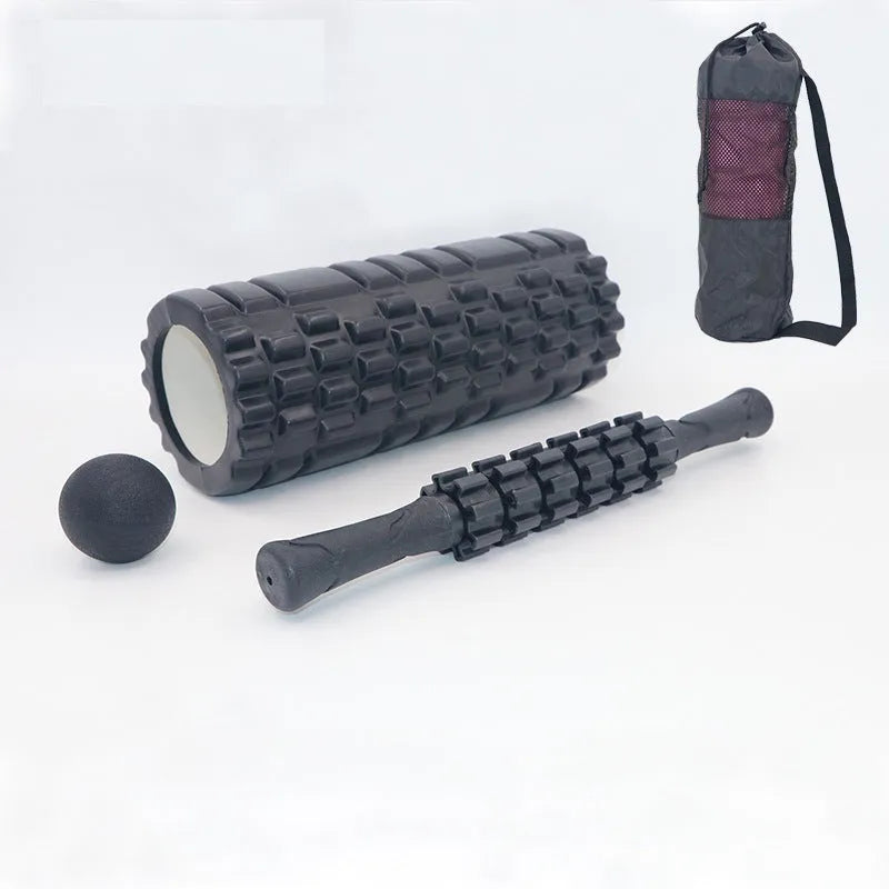 Black 33cm gear-textured foam massage roller on a white background.