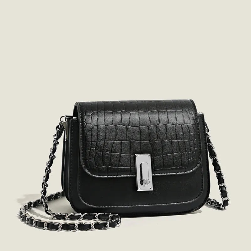 Green soft square women's cross-body shoulder bag with chain strap and external pockets.