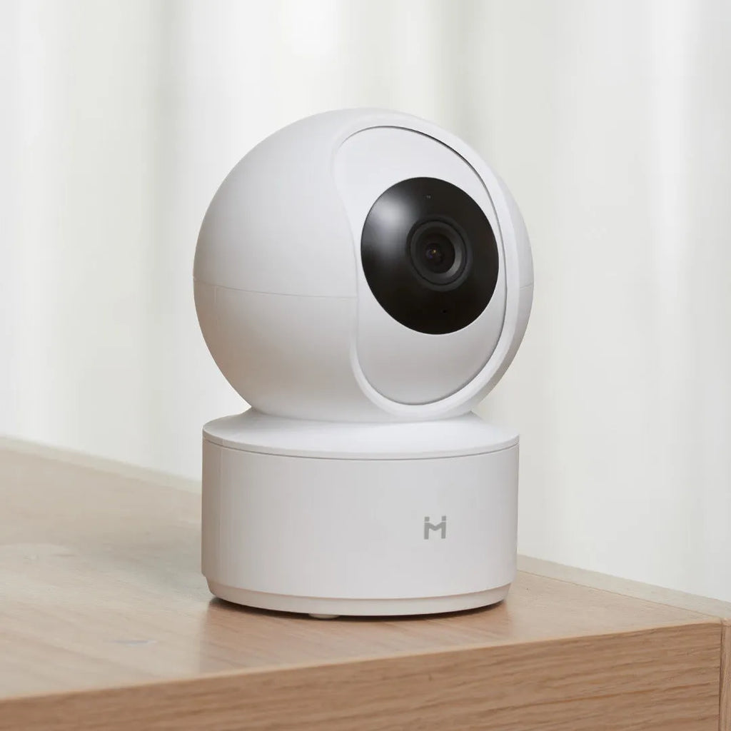 White Xiaobai smart security camera showing front view with lens