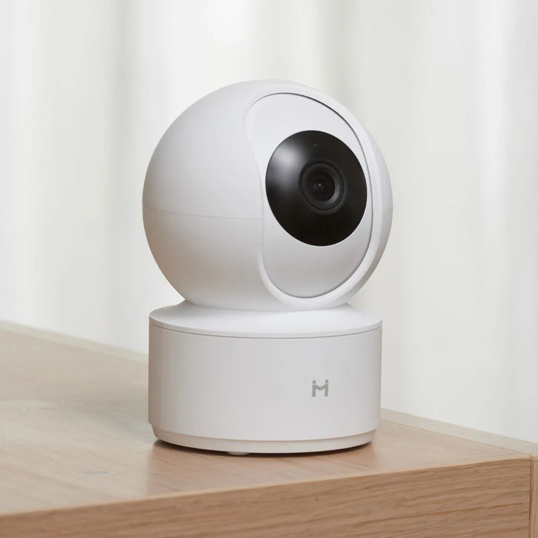 White Xiaobai smart security camera showing front view with lens