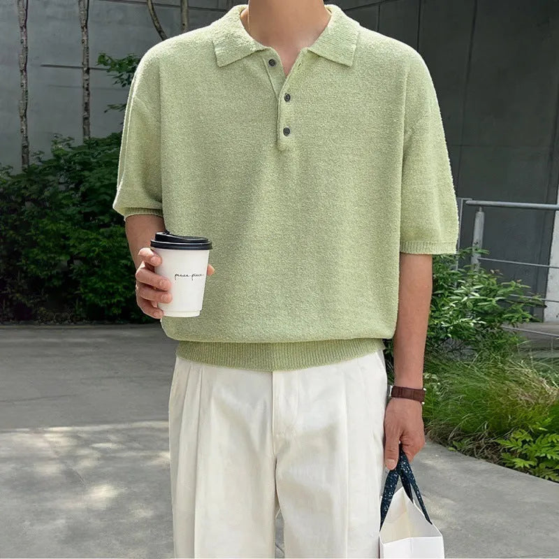 Retro loose-fit knitted polo shirt for men in caramel colour, showing asymmetric design and short sleeves.