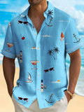 Man wearing a colourful loose-fit Hawaiian print short sleeve shirt.