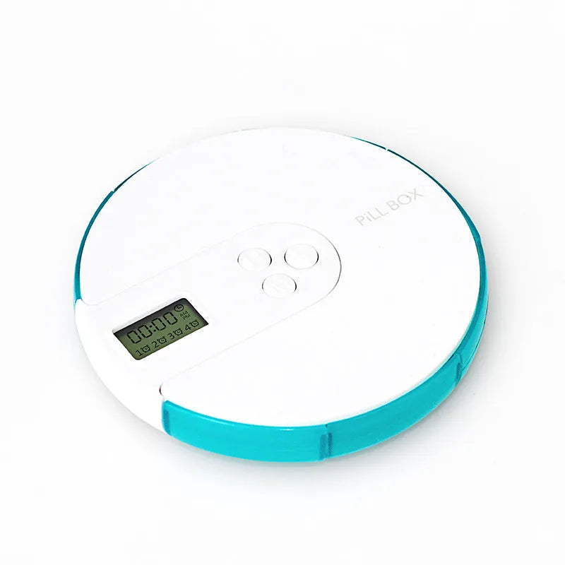 Blue 7-compartment weekly pill organiser with built-in digital alarm clock display, showing 11cm size.