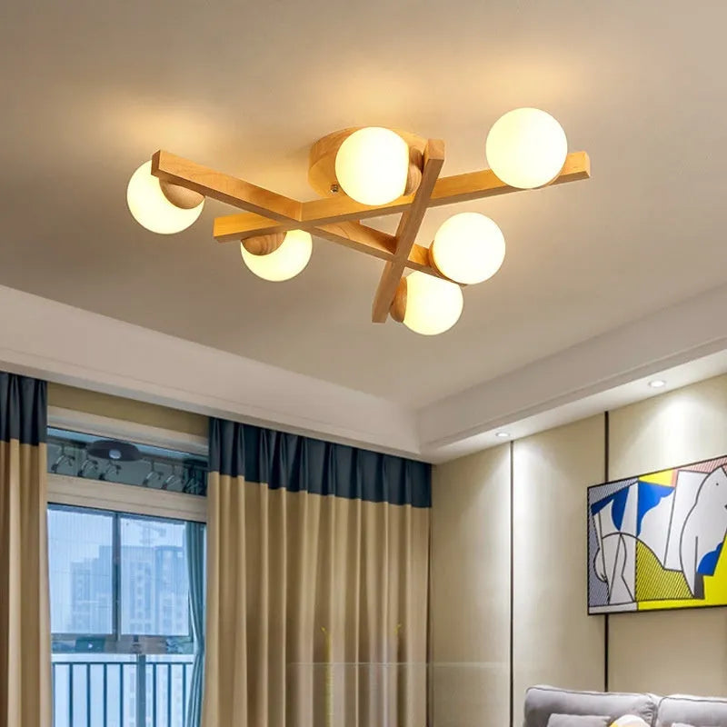 Modern wooden-style ceiling light with three adjustable light heads in a neutral finish
