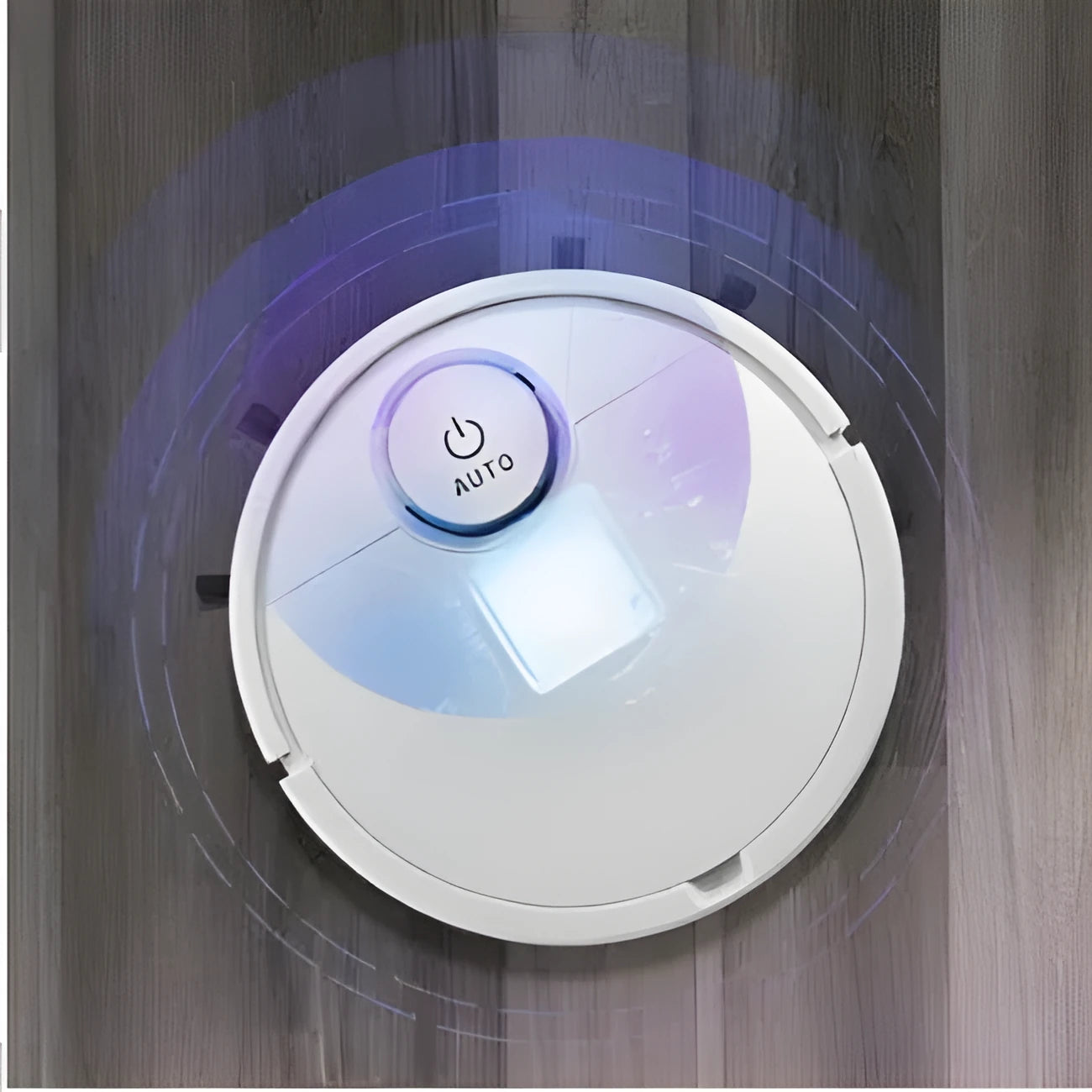 Automatic sweeping robot with 28cm diameter on a hardwood floor.