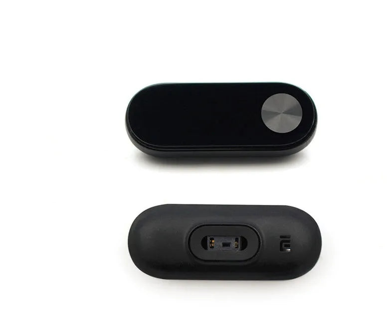 Black Xiaomi Mi Band 2 smartband with OLED display on a thermoplastic wrist strap.