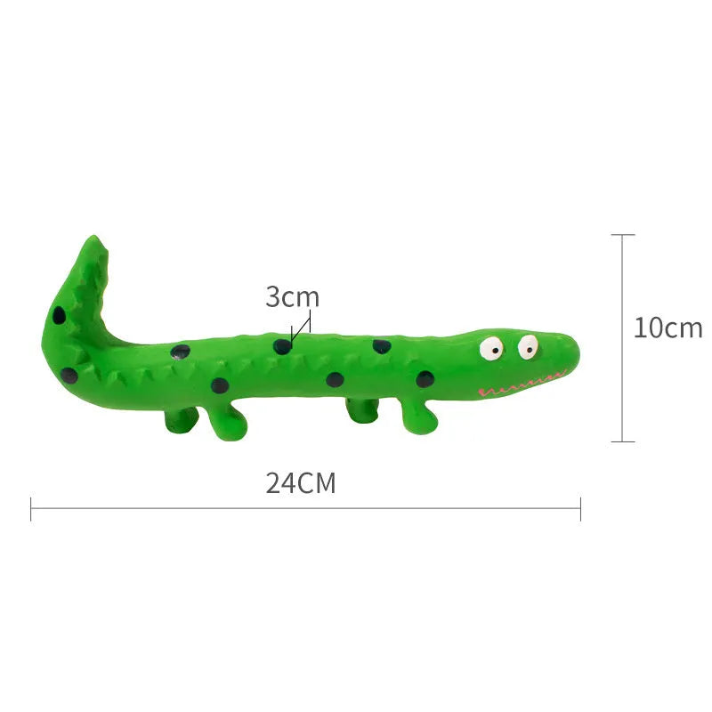 Green cartoon lizard-shaped dog chew toy with a squeaker on a white background.