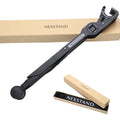 Black foldable portable laptop stand shown with its nylon carry bag and gaskets