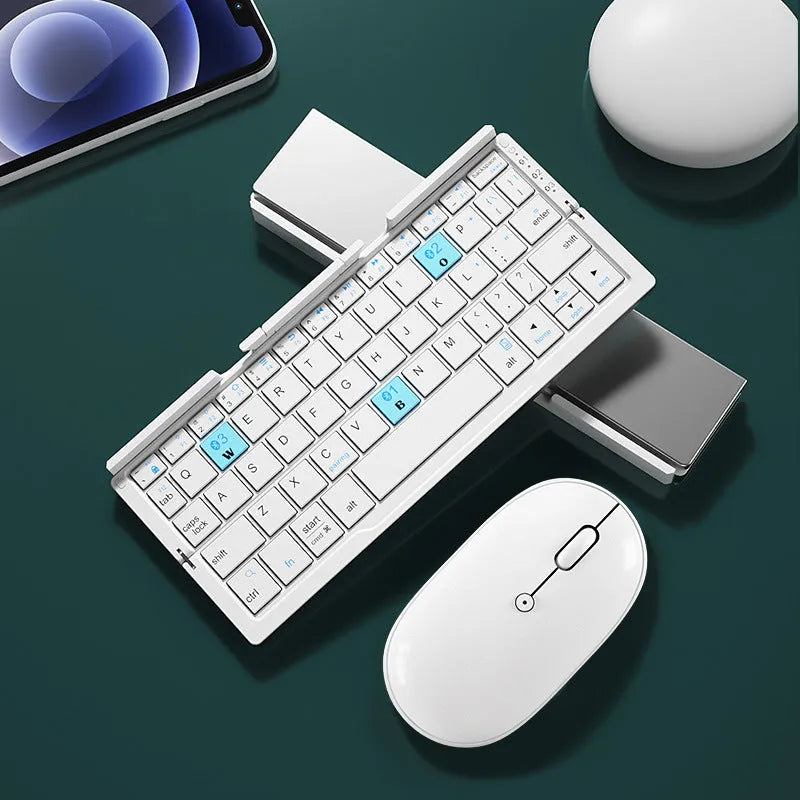 Silver aluminium folding Bluetooth keyboard shown open with phone on stand and folded to pocket size