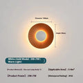 Round wall-mounted LED light with aluminium shade in a gold and white two-tone colour option.