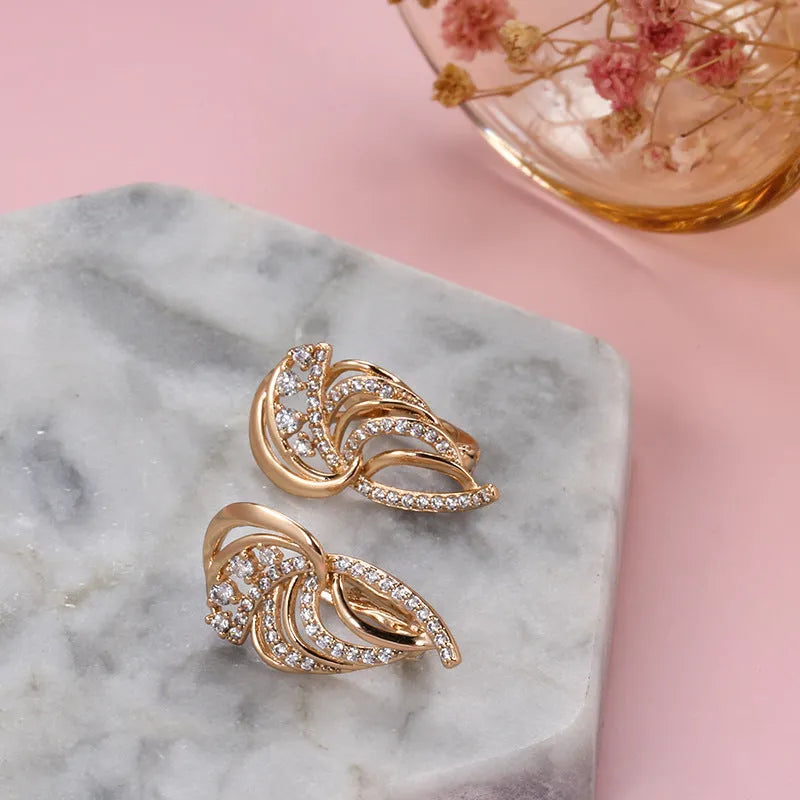 Women's elegant wings design micro zircon ear clips in gold-plated copper with stone inlay