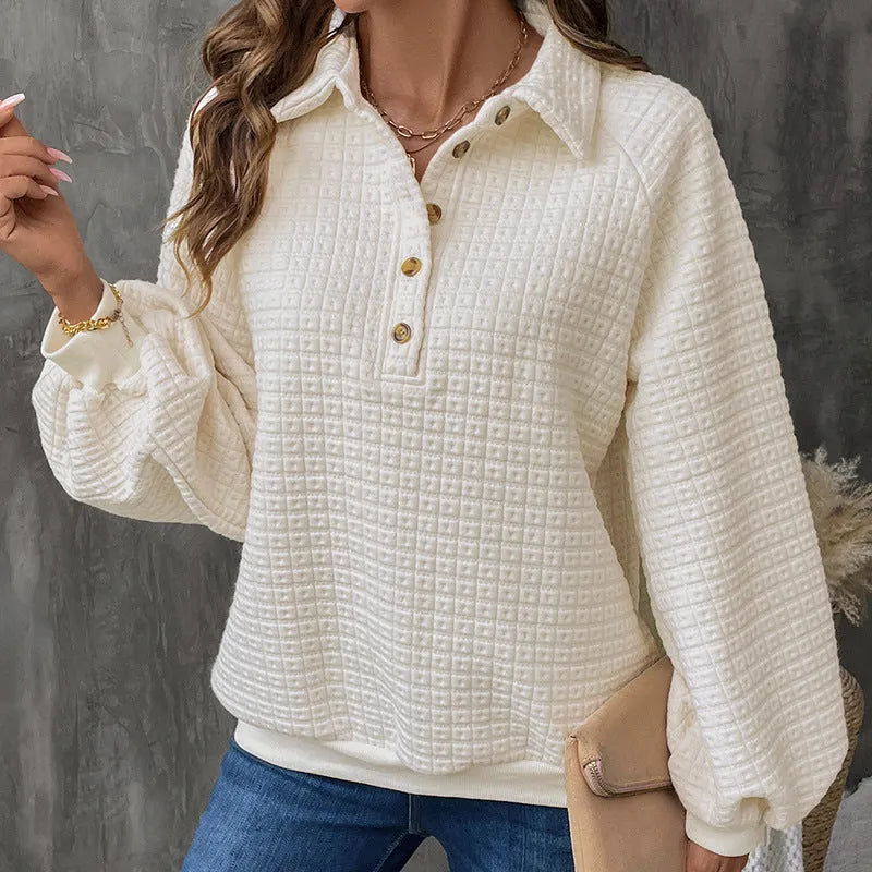Women's milky white thick knit sweater with a polo collar.