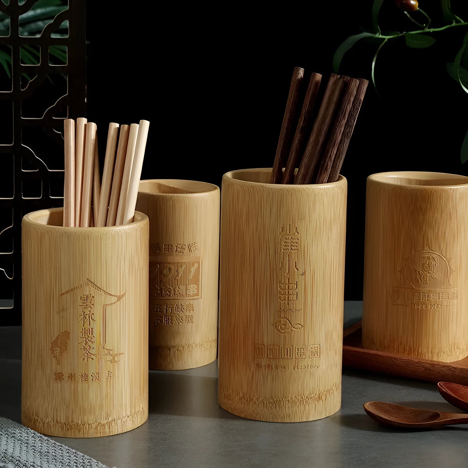 Bamboo chopstick holder in natural wood finish with creative design for kitchen utensil storage