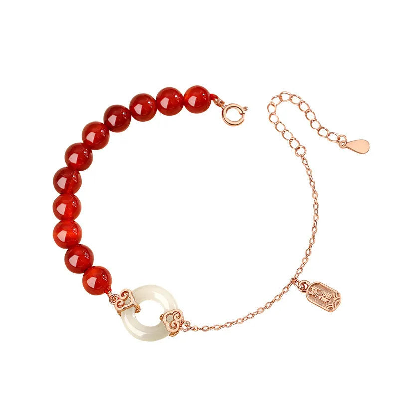 Women's sterling silver 925 bracelet with peace buckle, xiangyun, and fu character charms.