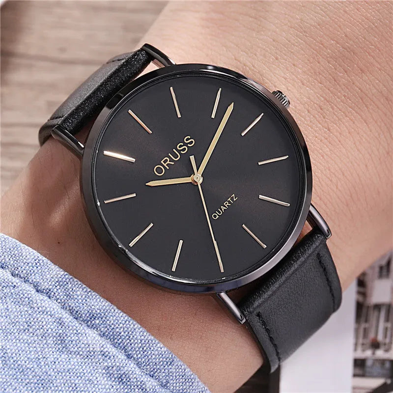 Men's ultra-thin quartz belt watch with alloy case, mineral glass mirror, black dial, and leather-style strap