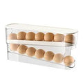 White plastic refrigerator slide-out egg tray with automatic dispenser mounted on refrigerator door