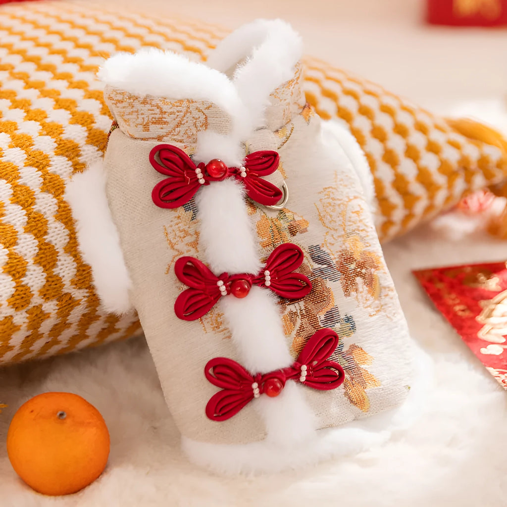 Red brocade pet vest with Chinese knot buttons and faux fur trim for Lunar New Year