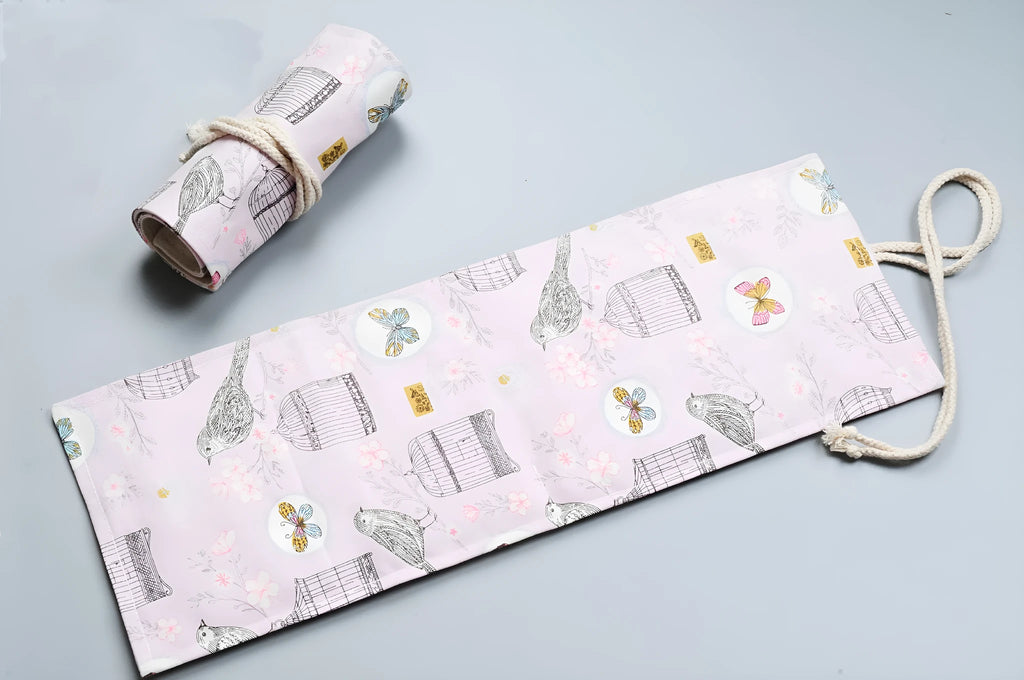 Canvas pencil wrap roll up case with elastic bands showing multiple slots for pens and pencils