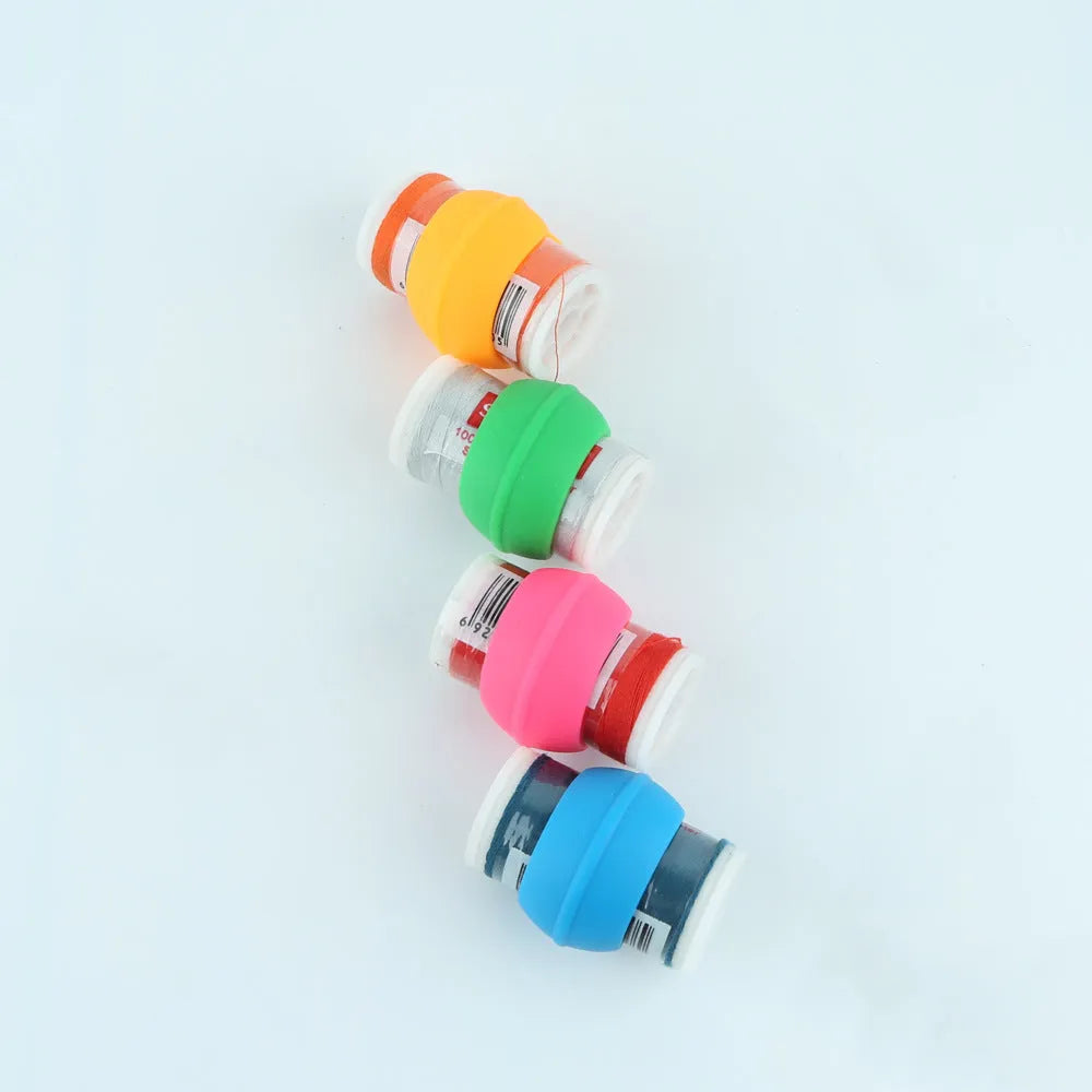 Set of 14 silicone sewing spool fixing clips in 20mm size in circle blue, green, orange, and pink