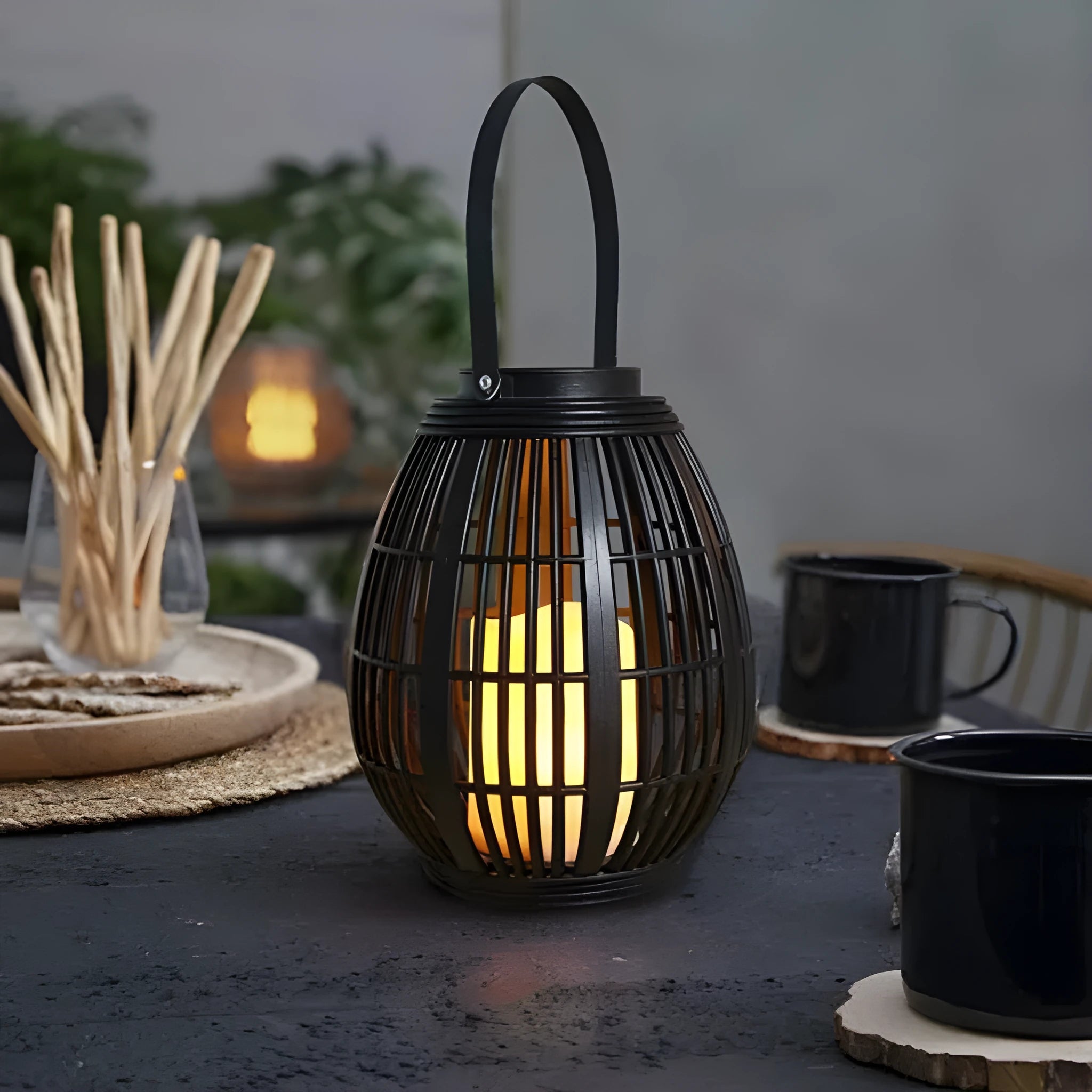 Oval solar garden light with rattan wind lamp design measuring 180x180x230mm