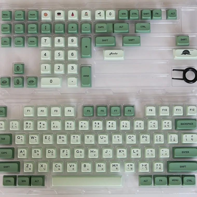 124-key matcha green PBT keycap set showing multiple international language layouts including Arabic and Korean.