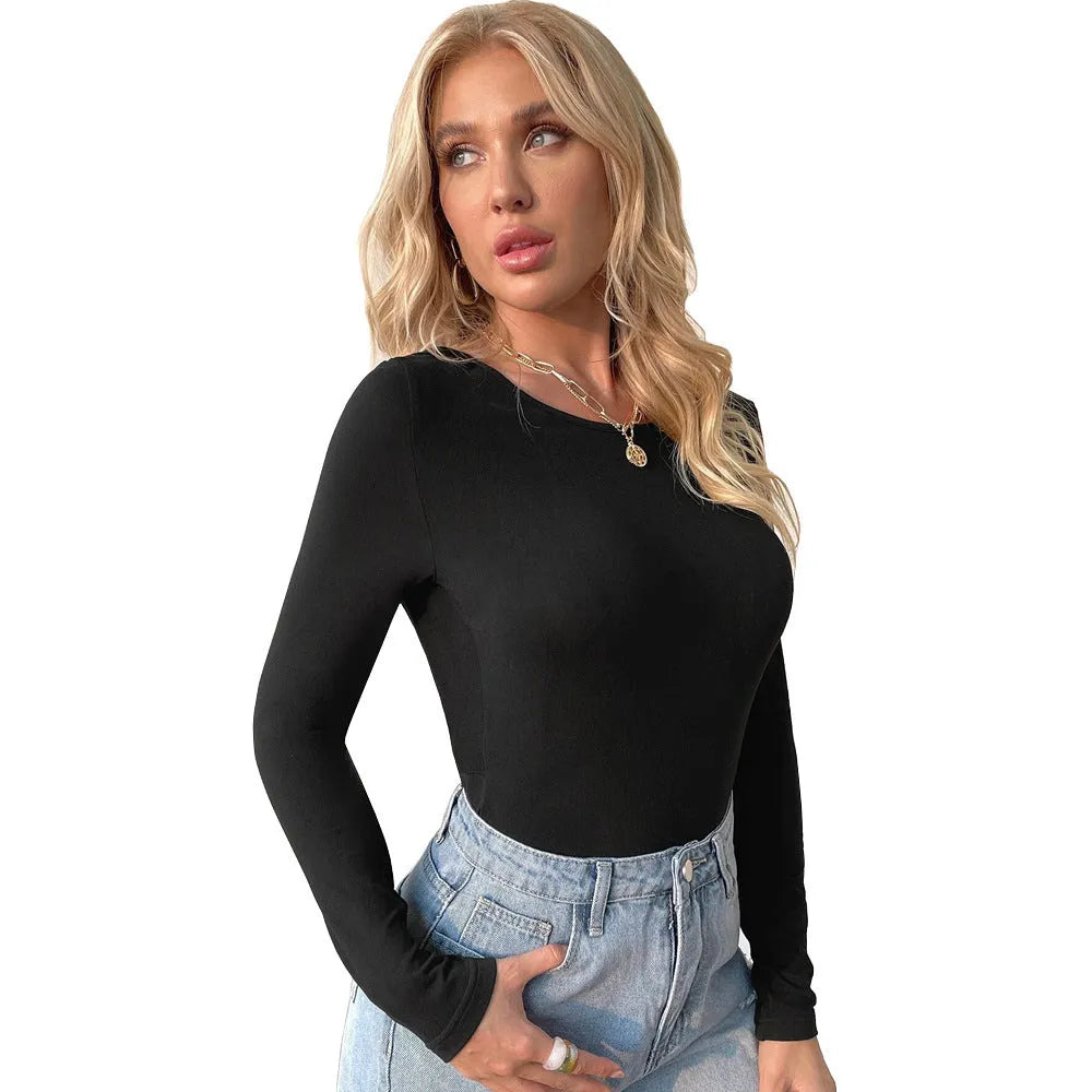 Women's backless round-neck slim-fit top in black polyester with long sleeves and patchwork detail