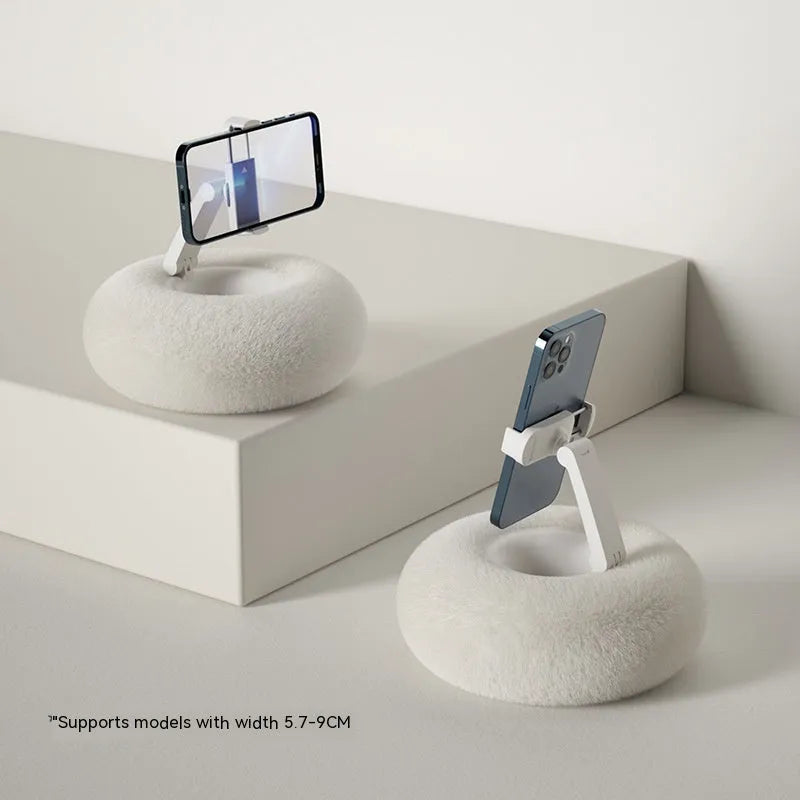 Rotating phone and tablet bracket with adjustable clamp extended vertically on desk