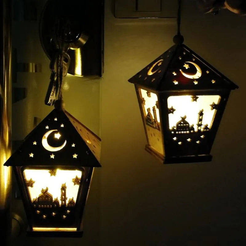 Three-dimensional carved boxwood house pendant with LED lights in blue colour option