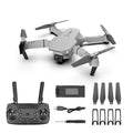 Grey foldable 4K dual camera aerial drone with remote control and carrying case