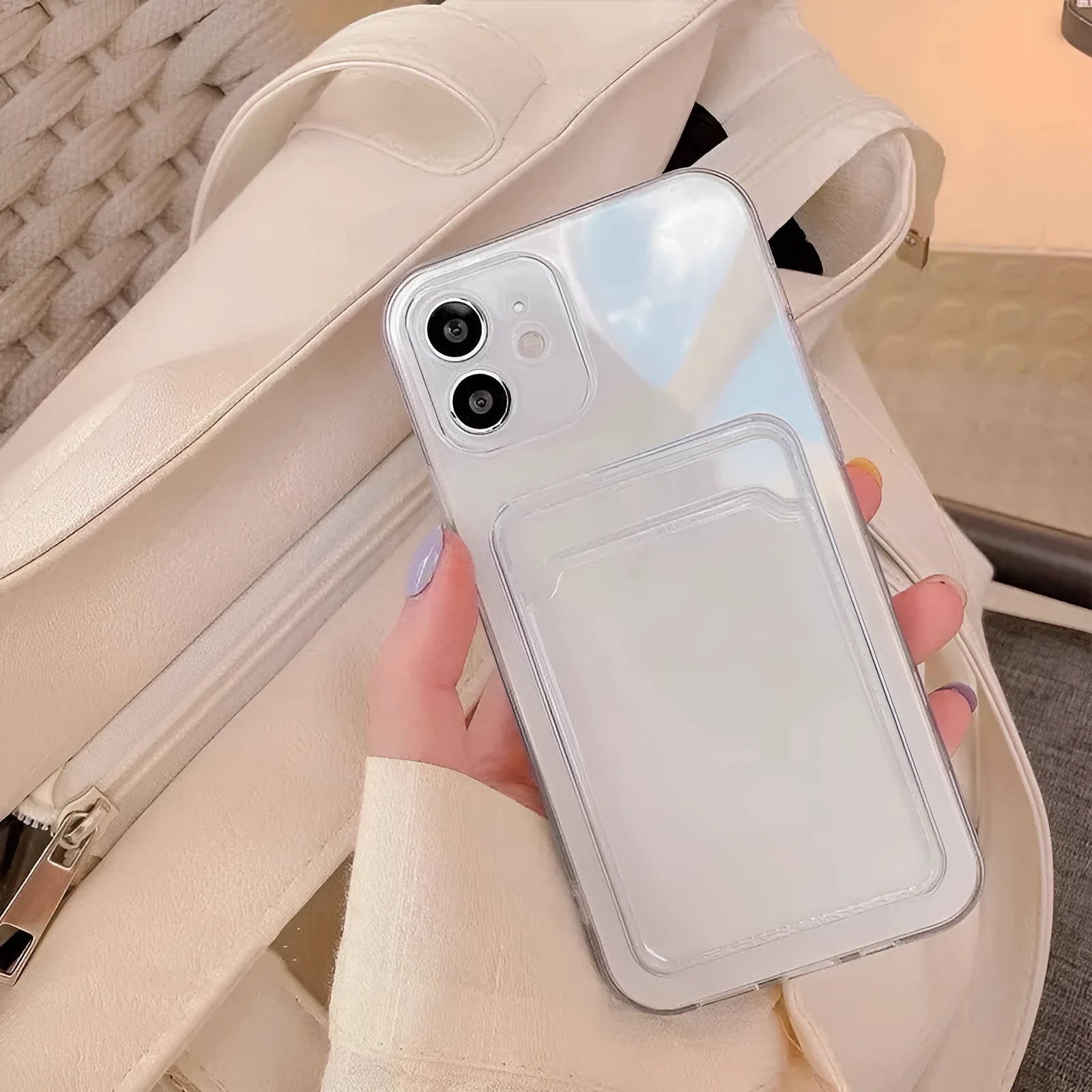 Clear transparent PVC iPhone case with a card slot on the back, shown fitting an iPhone model.