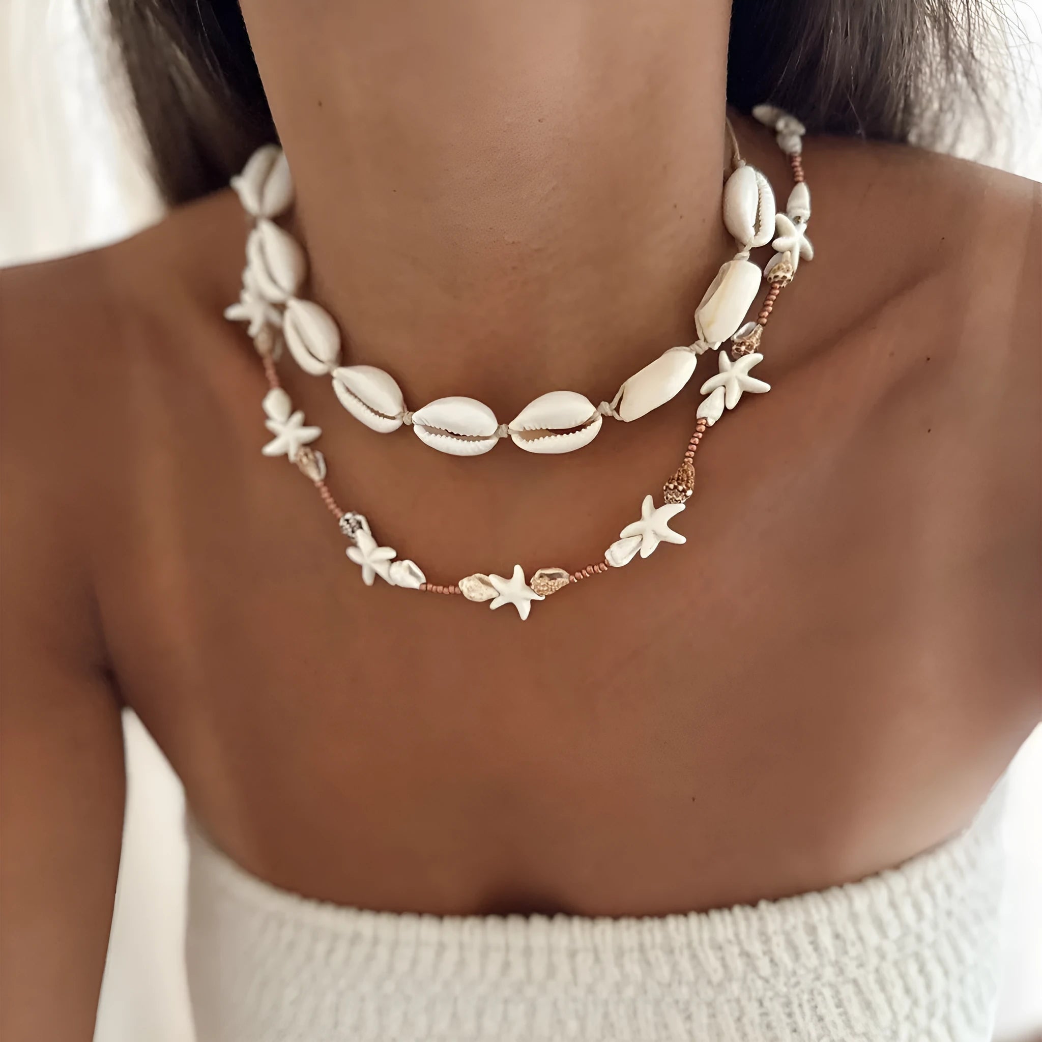 Handcrafted Bohemian shell necklace with geometric pendant on regular chain